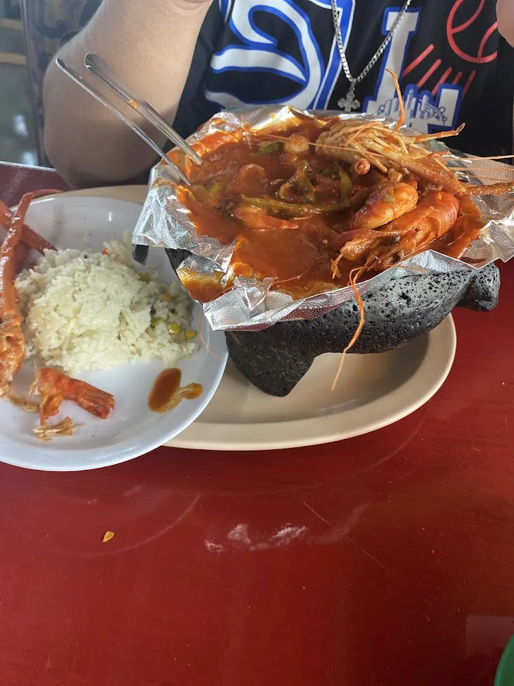 Seafood Soup Shrimp Squad Crab with a Spicy Sauce and Rice on the Side